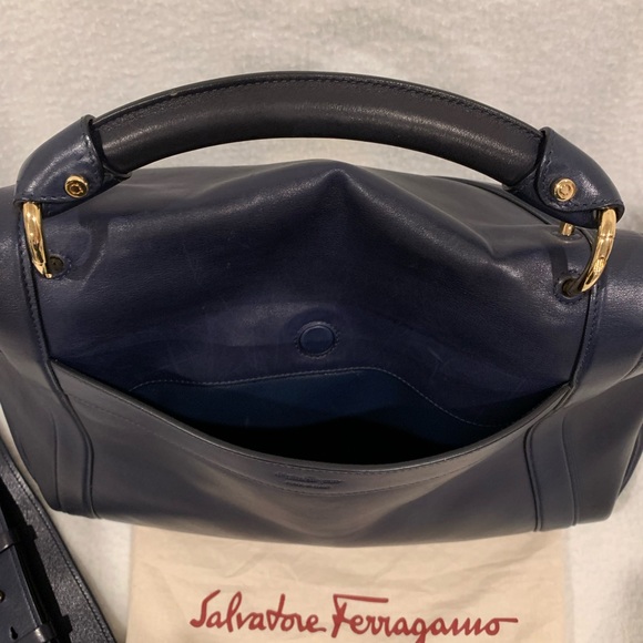 This classic navy leather handbag is a timeless piece. It was barely worn. - Picture 4 of 5